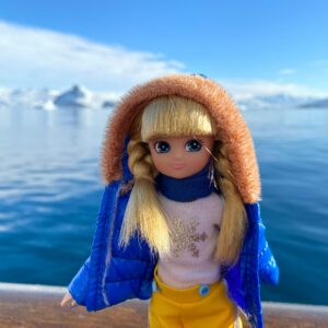 Snow Day – Lottie: Lifestyle shot of doll in boat in the arctic
