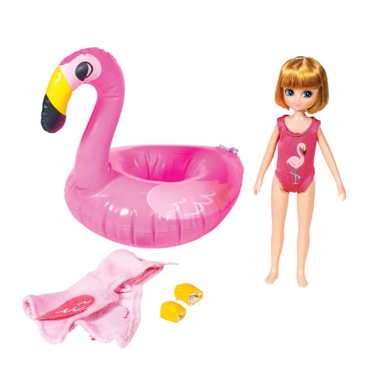 Pool Party – Lottie Contents: Doll in swimsuit, inflatable flamingo inner tube, hooded flamingo towel, yellow water wings