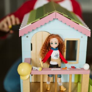 Young Inventor – Lottie on dollhouse with tools