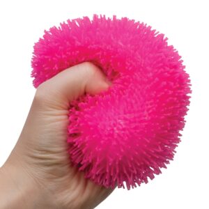 Hand squeezing pink Shaggy Nee Doh ball