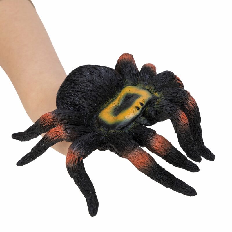 Stretchy spider Hand Puppet on hand, Black with yellow and red detail