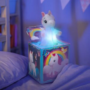 Pop & Glow light up Unicorn Jack in the Box on bed lighting up