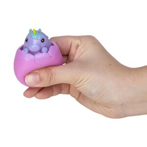 Squeezy Egg Popper toy in hand, squeezed and purple unicorn popping out