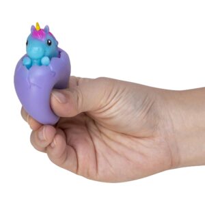 Squeezy Egg Popper toy in hand, squeezed and blue unicorn popping out