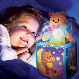 Pop and Glow Teddy Jack in the Box Lifestyle - Girl in bed looking at the jack in the box glowing