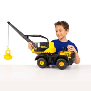 Tonka Crane lifestyle shot of boy with the crane on a table