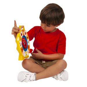 Lifestyle shot of boy playing with the Fisher-Price See N Say