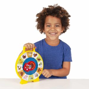 Lifestyle shot of boy holding the Fisher-Price See N Say