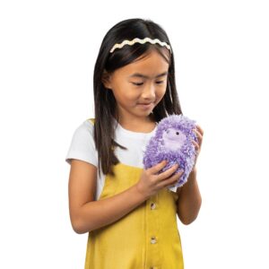 Girl holding Curlimals Higgle Hedgehog