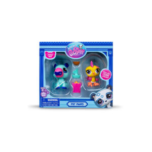 A Littlest Pet Shop "Pet Pairs" toy set in a blue box featuring a capybara figure and a rooster figure. Accessories include a coconut, toy boat, and popcorn. The packaging includes labels and a warning.