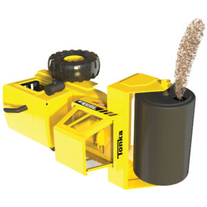 A yellow toy steamroller labeled "Tonka" is shown. The vehicle is tipped over on its side, revealing an opening in the roller and sand pouring into it. This is showing how to fill the roller with sand.