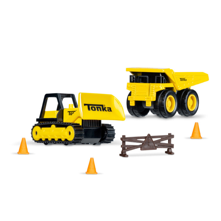 A set of yellow Tonka toy vehicles, including a bulldozer and a dump truck, positioned alongside three orange traffic cones and a brown construction barrier. The bulldozer has a large front blade, and the dump truck has an open bed for carrying materials.