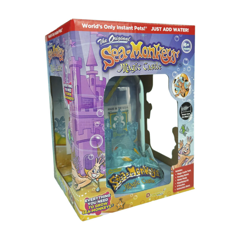 A box sitting at an angle with openings to the magic castle aquarium inside. The product name and information is visible on the package.